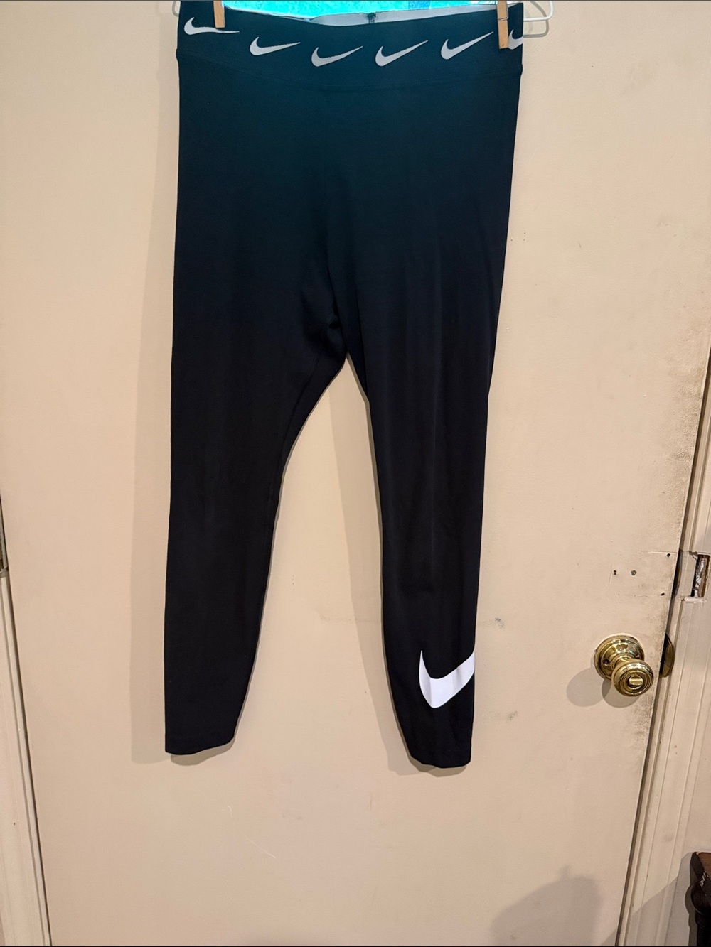 Nike Black Leggings with White Swoosh Accents